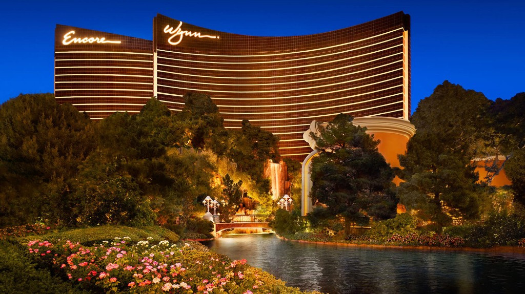 Wynn and Encore towers above the resort gardens at dusk